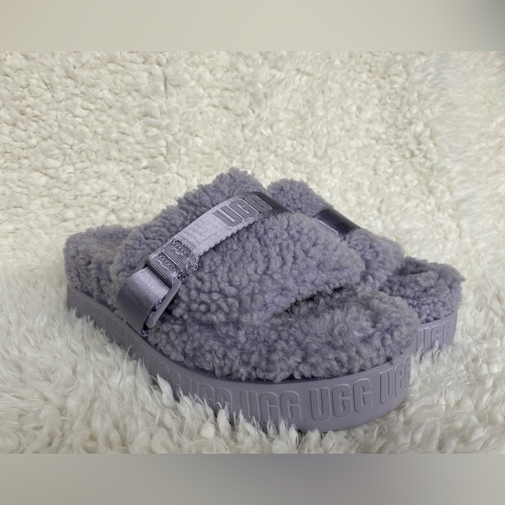 Fluffy lavender colored UGG slippers size 10